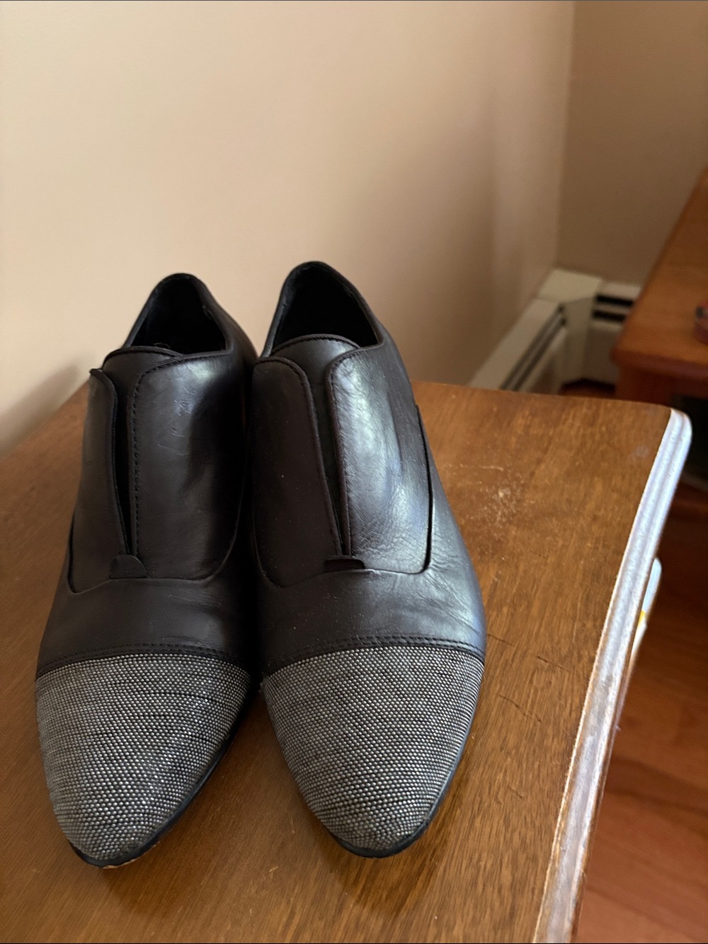 Women’s Dolce vita slip on with black leather and silver toe